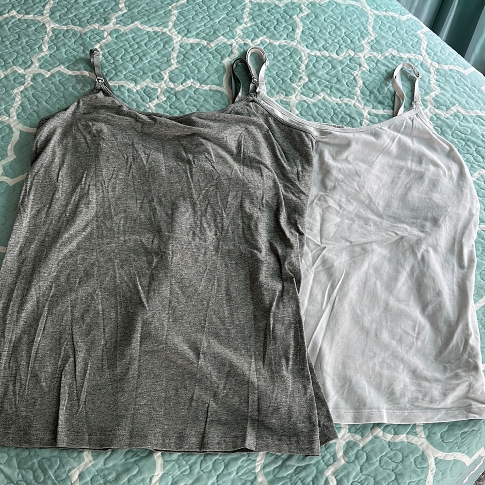 Two nursing tanks